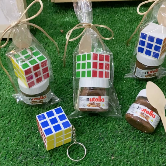 Lote de 10/15 regalos para niñas niños Nutella mini con cucharita de madera y cubo mágico de colores en bolsa de regalo lazo color champan regalos para niñas niños cumpleaños comuniones bodas regalos originales para niños - 1