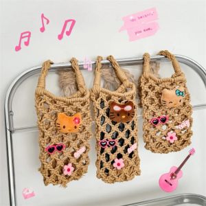 คริสต์มาสฮาโลวีน Sanrio Hello Kitty กระเป๋าคาดลำตัวสไตล์ฮาวาย กระเป๋าคาดอกลายการ์ตูนถักกระเป๋าโทรศัพท์ขนาดเล็กสีดำสำหรับฤดูร้อน