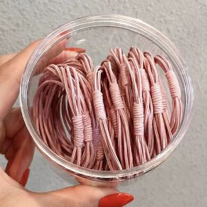 ที่คาดผมสี่ในหนึ่งเดียวสีทึบเรียบง่ายเวอร์ชั่นเกาหลี 20 กล่องอารมณ์ยืดหยุ่นสูงนักเรียนมัดผมหางม้ายางรัดผม