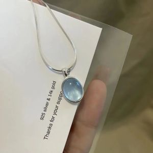 SEA AMILA Mặt đá Mặt Trăng Aquamarine vòng cổ nữ 2026 ánh sáng mới sang trọng hốc xương đòn dây chuyền nữ xương rắn dây chuyền áo len dây chuyền phụ kiện