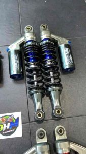 โช๊คหลัง OKD เเท้ รุ่น Rev Junior ใส่ เวฟ ดรีม สูง320มิล ตัวโช๊คเป็นระบบเเก๊ส สามารถปรับนิ่มเเข็งที่สปริงได้ (หูล่างหลบบังโซ่)