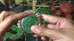 ข้อมือเชือกถักเหรียญจีนหยกผสมควอต์