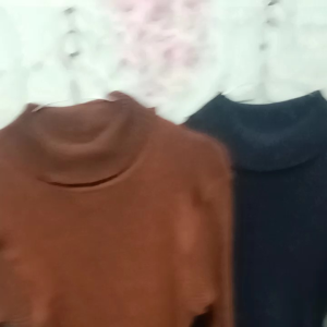 sweater rajut kerah tinggi wanita jumbo