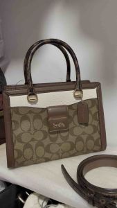 Like new preloved authentic Grace Carryall in signature pvc leather 2way top handle bag