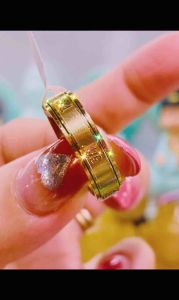 Nhẫn titan khắc chú Ommani bình an may mắn bản xoay cho nam nữ bền đẹp
