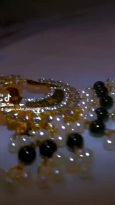 Gold color based statement stud earring with black beads & pearls - Traditional Indian style
