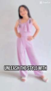 kids asymmetrical jumpsuit can fit 7 yr old up to 10 yr old