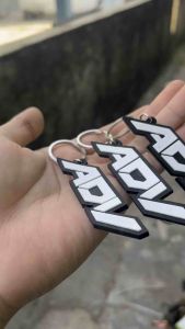 gantungan kunci karet logo ADV fungsional