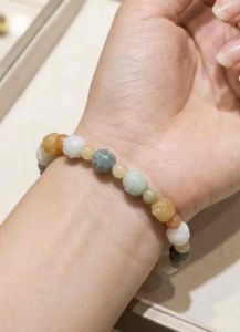 Vòng tay đá ngọc cẩm thạch tam tài chạm bông hoa sen bình an may mắn