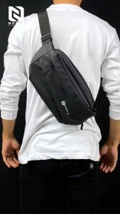 Tas Selempang Pria Waterproof: Slingbag Anti Air & Desain Ergonomis