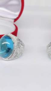 แหวนเงินผู้ชายข้างครุฑใหญ่สีฟ้าบลูโทพาสหลังเบี้ย