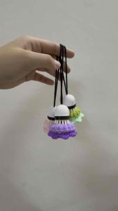 Handmade crochet shuttlecock keychain