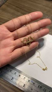 PAWNABLE 18K Saudi Gold Triple Heart Necklace(open back pendant)