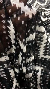 vải thun lưới họa tiết trắng đen _( khổ 1m6) co dãn 4 chiều may đầm váy áo thiết kế vv