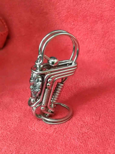 พวงกุญแจสแตนเลสหน้ามังกร งานทำมือ" - พวงกุญแจสแตนเลสหน้ามังกร งานทำมือ