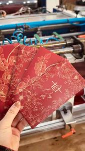 Bộ 50 lì xì Tết 2027 – Lì xì truyền thống gấm hoa Bé Ngoan hot trend thiết kế dày dặn
