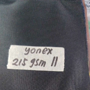 Yonex 215 gsm fabric sold per roll in various colors including gray yellow brown orange purple blue and gray.