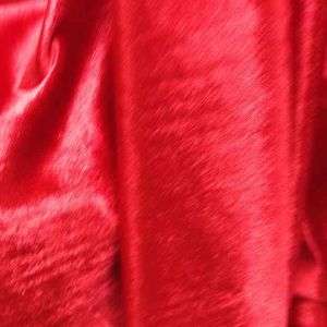 ผ้ามะตรีกำมะหยี่ขนสั้น เนื้อนูมะขาม สีแดง เมตรละ100บาท หน้ายาว 150cm