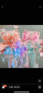 Kẹp tóc nơ cổ trang tua hạt cho bé