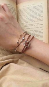 Vòng tay Kenzo - vòng da khoen gỗ vuông tròn vintage