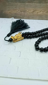 Tasbih Batu Black Oval Kepala Naga: Tasbih Unik untuk Pria