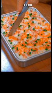 White Shark Cantonese Radish Cake Powder 500g. - Orange and white packaging featuring radish cake image suitable for home baking.