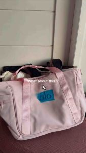 RCW Alo Tote Shoulder Bag brown tote bag with logo and straps on display stand