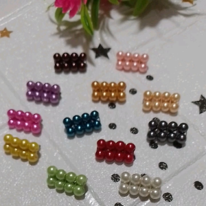 2model/Bros dagu hijab mutiara isi 2gros