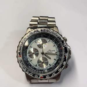 Đồng hồ nam 6 kim hiệu DYSASTY PREMIER size 43mm  3 cốt  Chronograph niềng khía  niềng xoay  mặt khảm trai  kim dạ quang