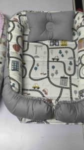 Oval Nest with Headpillow Bolsters and Comforter