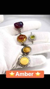 NATURAL AMBER RINGS AND CHARMS