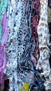 Colorful fabric bundles for doormats and pot holders 10kg per bundle assorted colors including gray orange pink red black and beige.