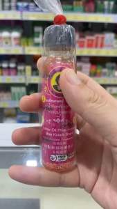 น้ำมันเหลืองสูตรไพล แม่กุหลาบ ขนาด 20 cc