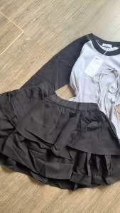 Set Bộ Áo Thun RapLang Tay Dài BabyTea Đính Nơ Croptop + Chân Váy Tầng Xoè Đính Nơ Có Lót Quần