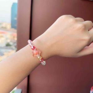 กำไลข้อมือดอกไม้ กำไลยางยืดสีรุ้ง