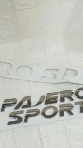 emblem kap mesin pajero sport