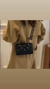 Woman mini sling bag