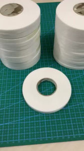 Keo chống bai giãn màu trắng dùng ủi vải bóngvải trơn trượt