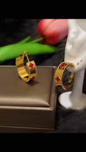 ZIHANG JEWELRY 24K titanium gold plated automatic lock hoop earrings for women