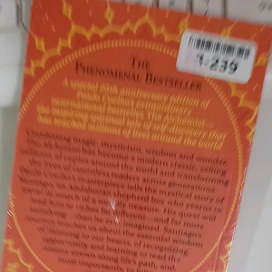 THE ALCHEMIST by Paulo Coelho paperback only with magnetic bookmark