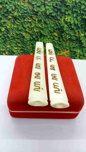 padutan once tulang sapi oval ukir aksara Jawa