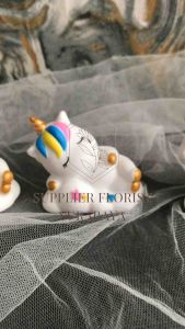 Dekorasi Kue Ulang Tahun Anak Perempuan dengan Miniatur Unicorn