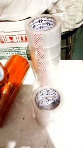 Lakban Isolasi Bening & Cokelat Tebal 045 Micron: Harga 1 Roll Murah