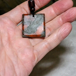 Baoshan Nan Hong Da heidong with "skin" Wu Shi Pai pendant 保山南红大黑洞带皮无事牌吊坠