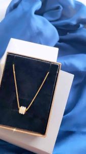 Kalung Titanium Lapis Emas Permata CXB543