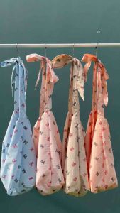 กระเป๋าผ้าลายโบว์ น่ารักๆ ริ้วลายทางพิมพ์นูน มี4สี 🎀🤍꒰⑅⸝⸝ᵕ ༝ ᵕ⸝⸝⑅꒱ 👛