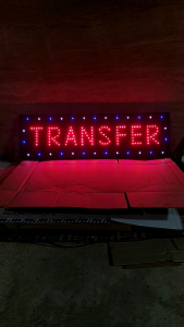 tulisan TRANSFER huruf besar
