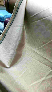 (hrg PerCelana)Kain Bahan Celana semi wool kilap shining Cristian Dean