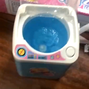 Đồ chơi nhập vai Máy giặt mini xài pin xả nước