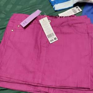 กระโปรงเด็กโต เด็กผู้หญิงสีชมพู-ม่วง วัย 7-9 ขวบ พร้อมส่ง ป้าย f&f ลด 50%